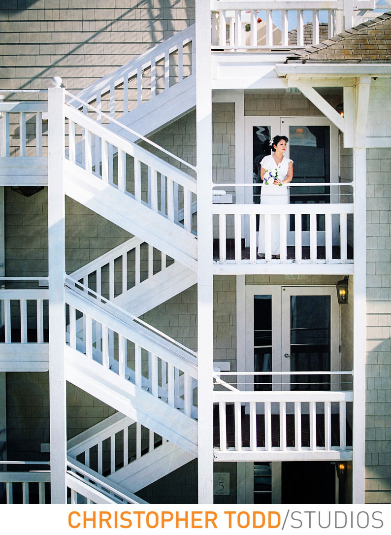 portrait-bride-stairs-shutters-beach-hotel