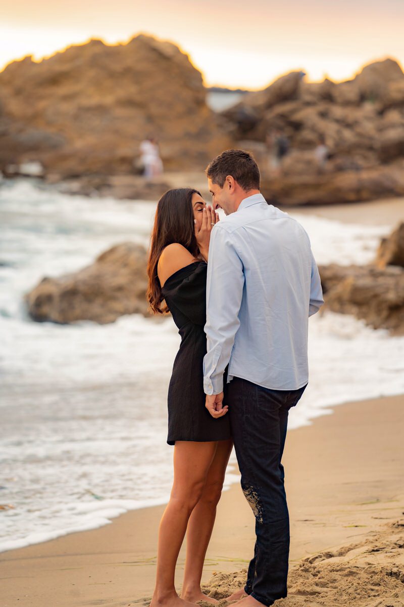 surprise proposal on the beach