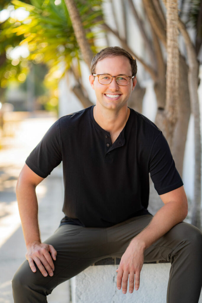 Dating app profile perfection: A talented photographer in Costa Mesa frames a young man confidently donning a sleek black shirt.